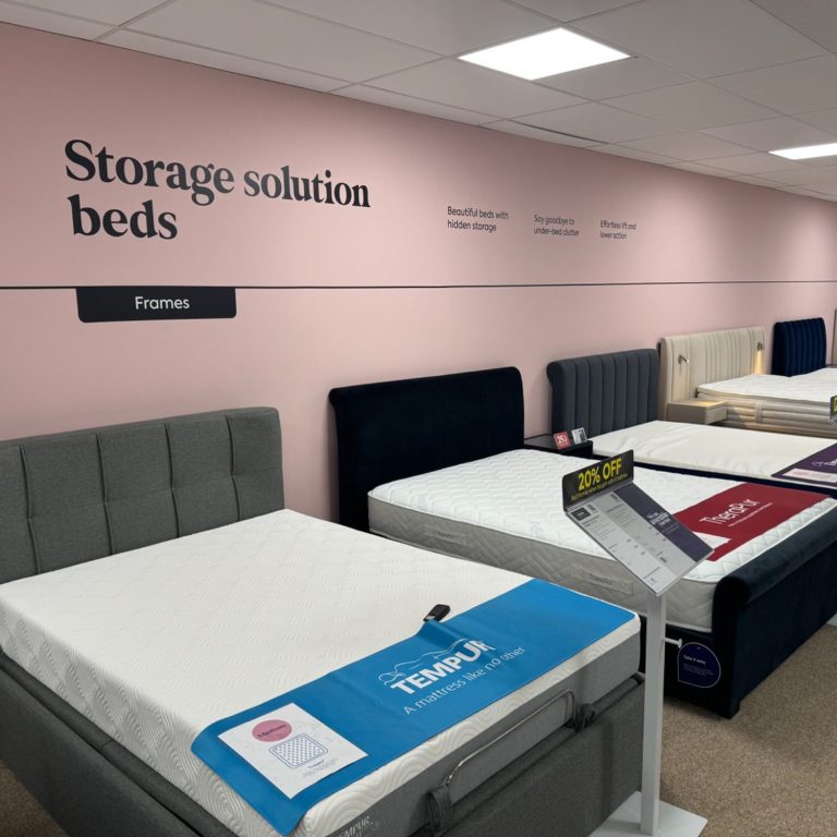 Retail point of sale vinyl graphic installation | The Vinyl Bay Point of sale vinyl signage installation for Dreams retail shop.